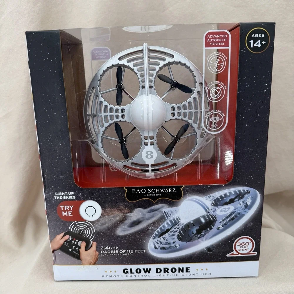 FAO Schwarz Glow Drone Remote Control LED Stunt UFO Drone Lights 360° Flips Gyro